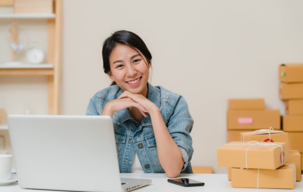 business-woman-feeling-happy-smiling-looking-camera-while-working-her-office-home