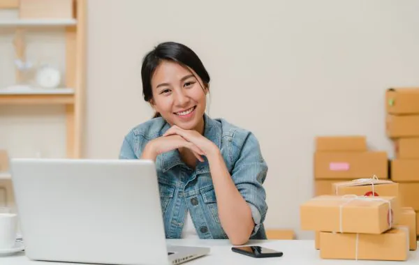 business-woman-feeling-happy-smiling-looking-camera-while-working-her-office-home